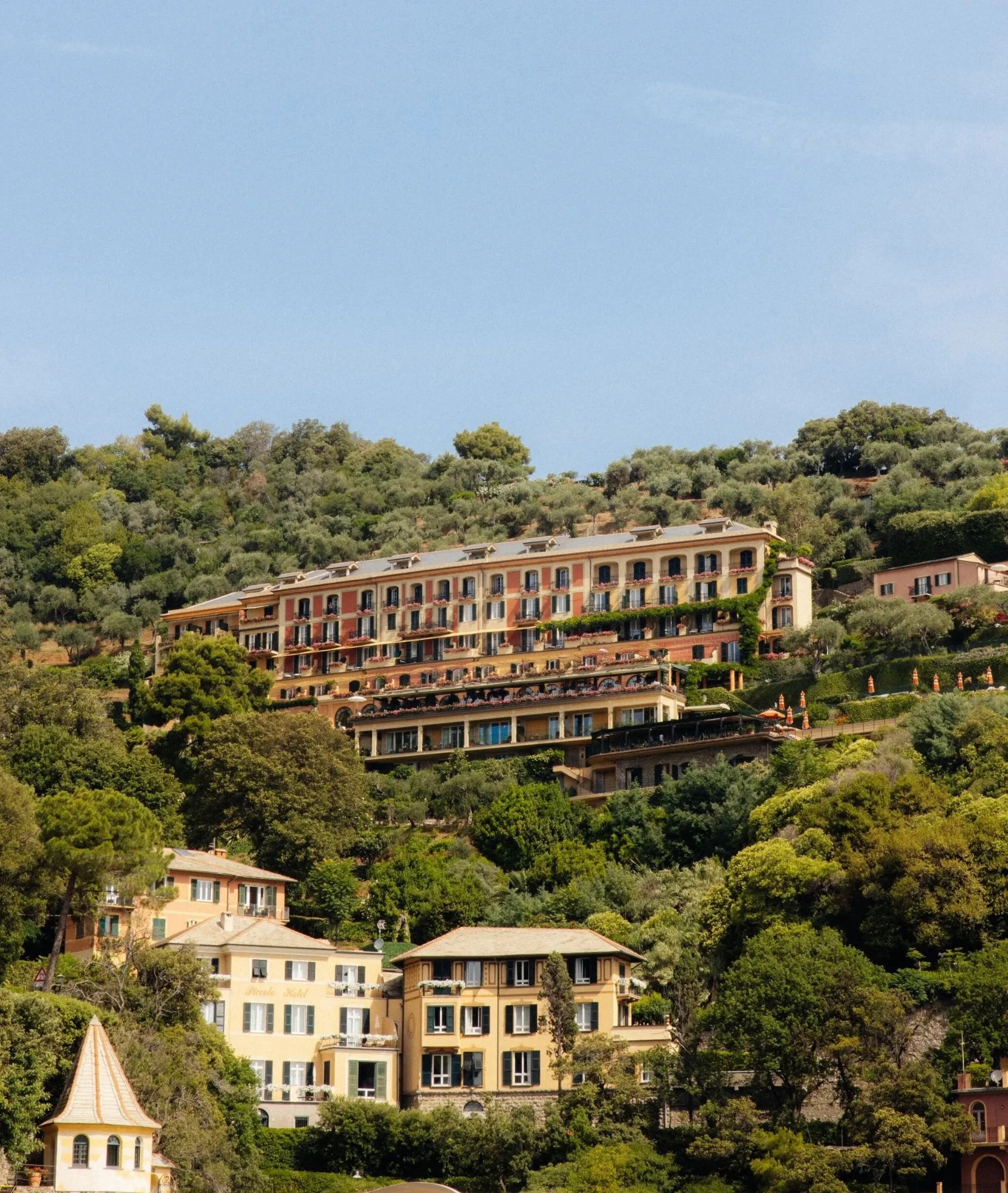 Splendido, A Belmond Hotel, Portofino, set into the green Ligurian hillside above the Italian Riviera.