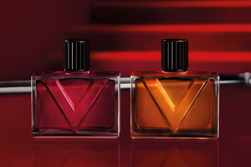 Valentino Vendetta Donna and Vendetta Uomo fragrance bottles against a red backdrop