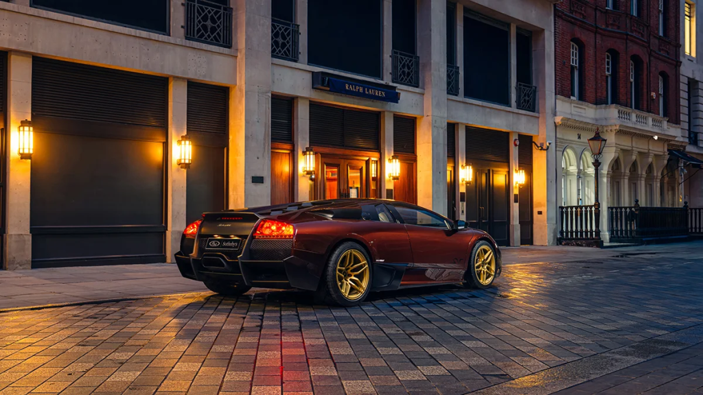 Rear three-quarter view of the Marrone Eklipsis Lamborghini Murciélago LP 670-4 SV at dusk.