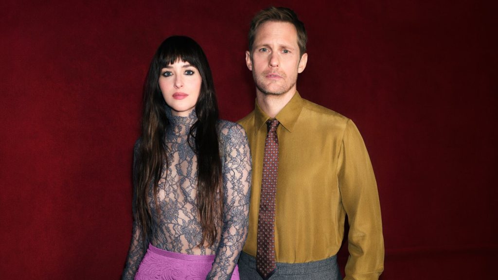 Valentino Vendetta campaign portrait of the two fragrance ambassadors against a dark red background