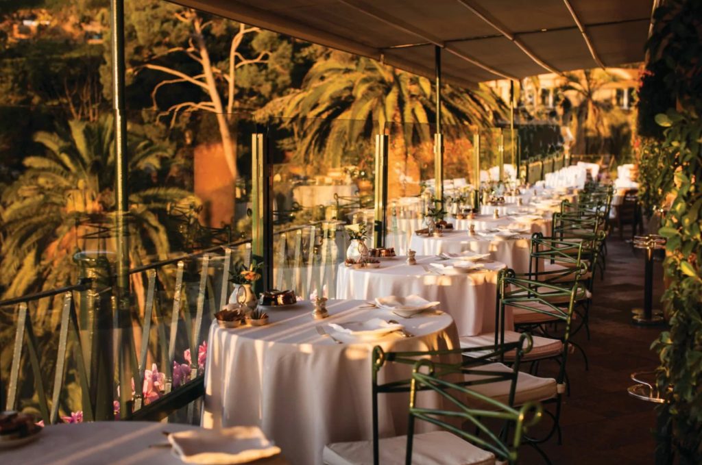 La Terrazza at Splendido prepared for dining at golden hour.