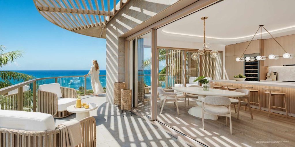 Light-filled Nikki Beach residence in Antigua with open-plan kitchen, dining area and terrace facing the Caribbean Sea.