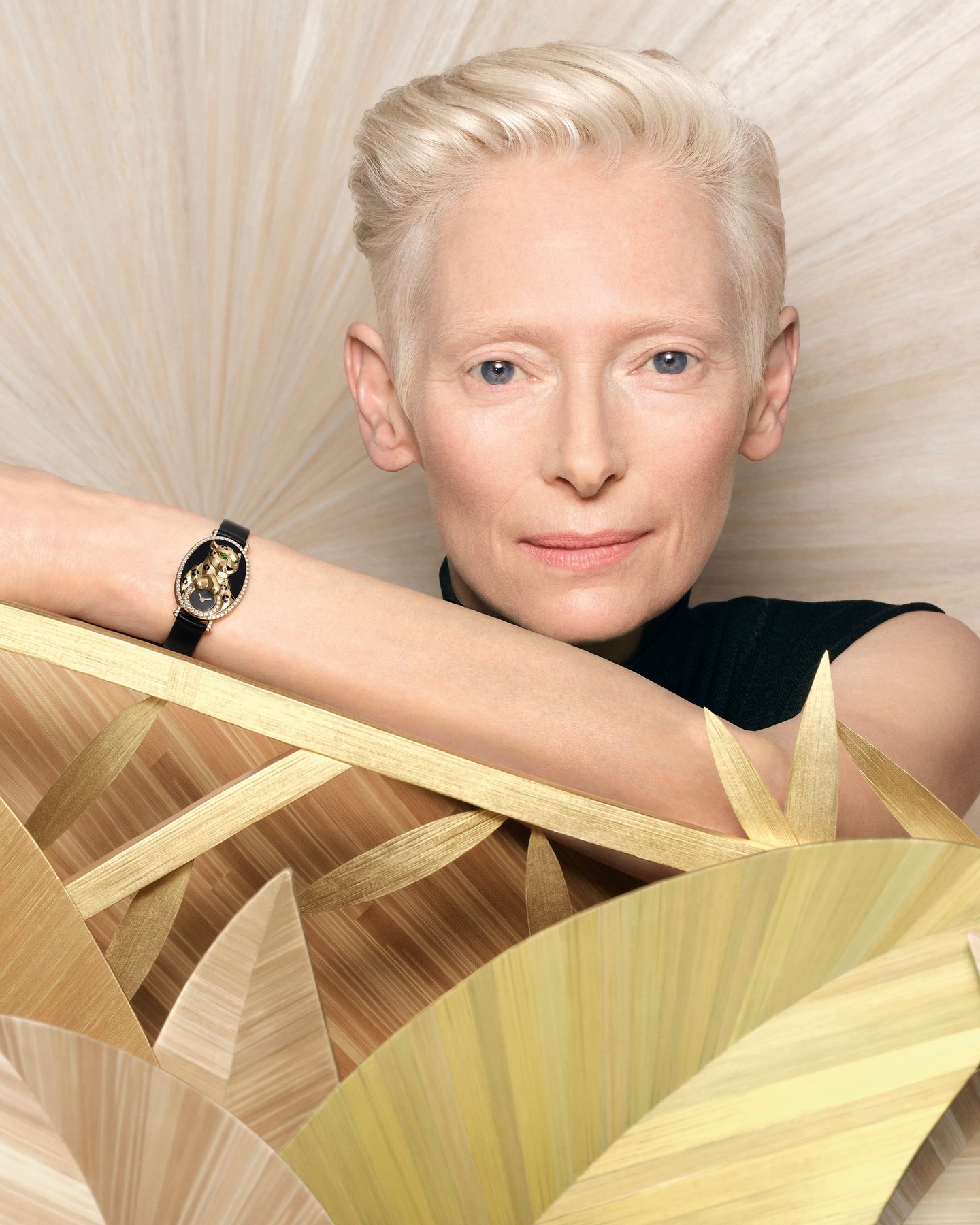 Tilda Swinton wearing the sculptural Cartier Panthère jewellery watch from the Into the Wild chapter.