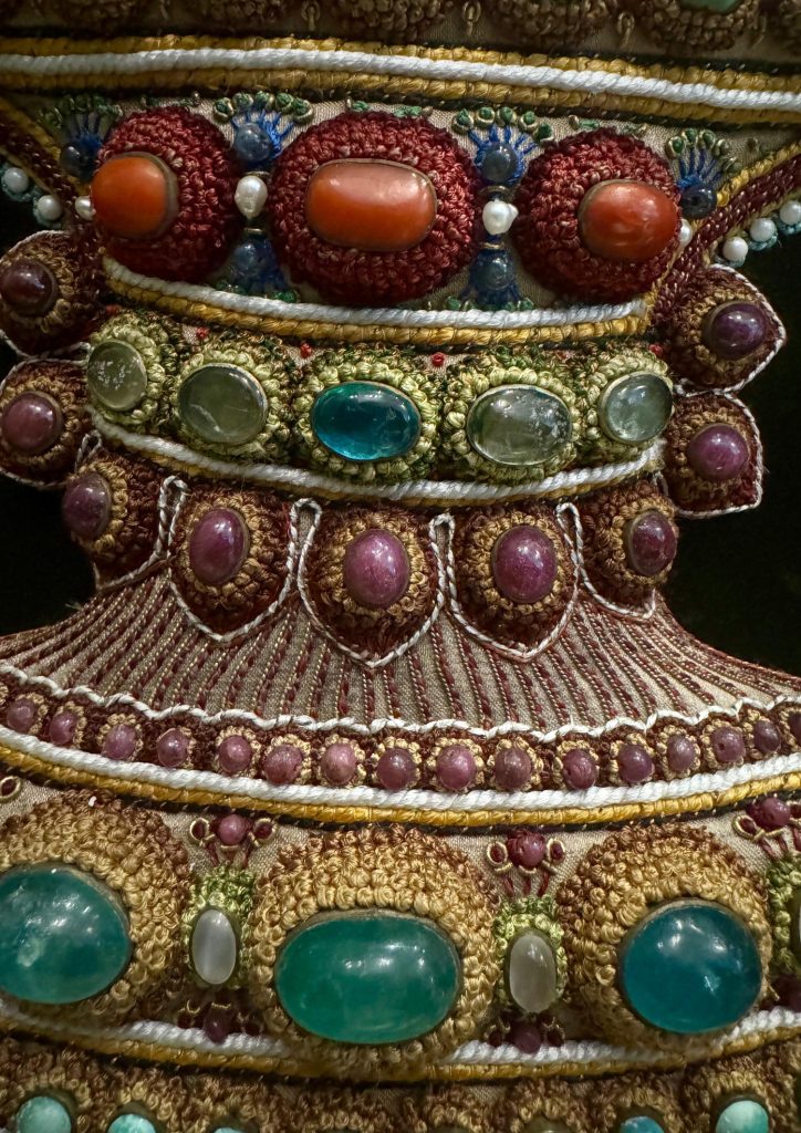 Gem-set stem of the vessel in The Vase, with cabochons, pearls and intricate threadwork.