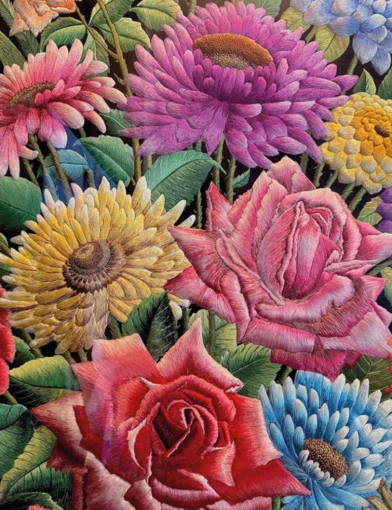 Raised pink, red, purple and yellow silk flowers in The Vase by Shams Uddin.