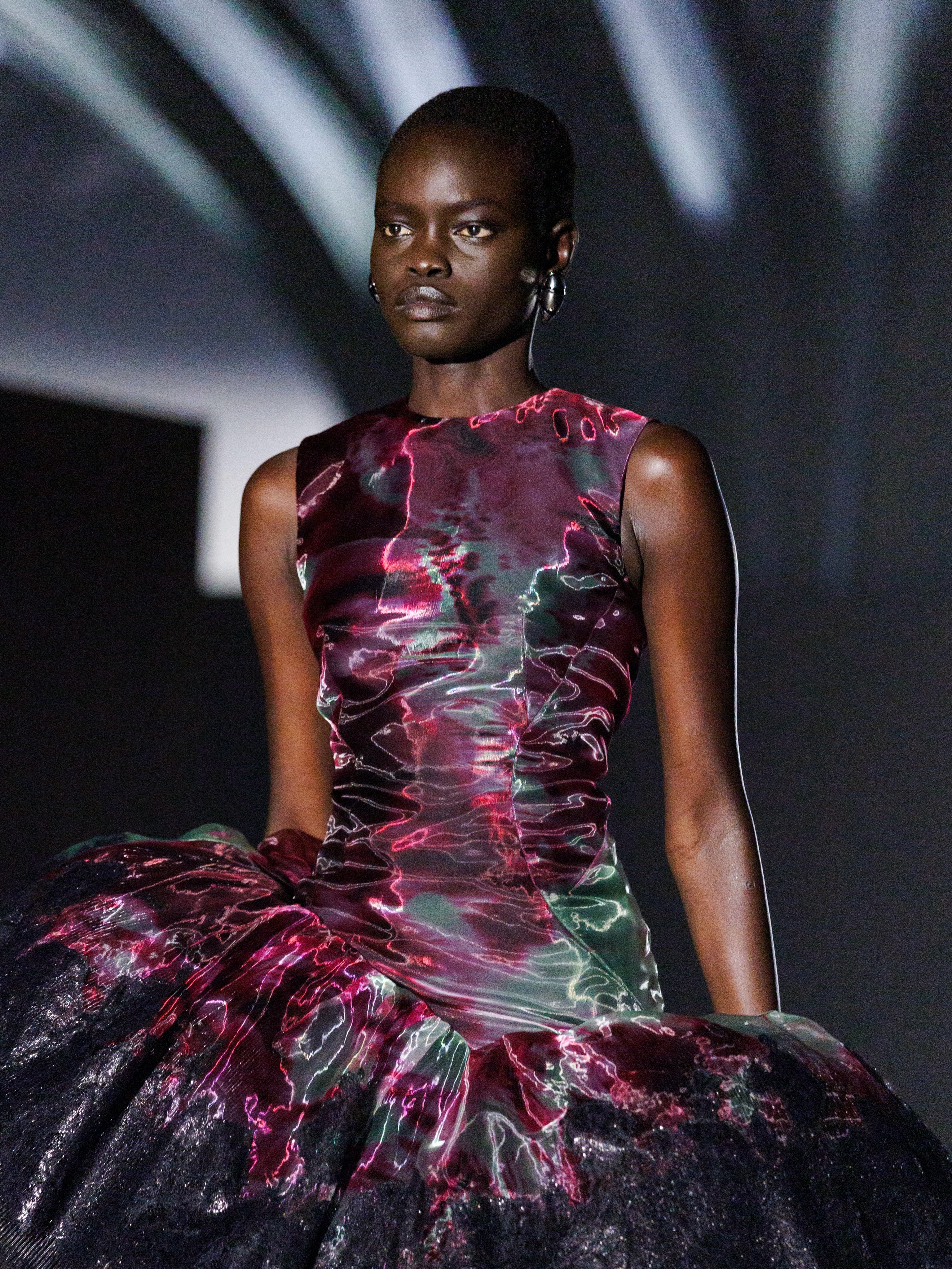 Alexander McQueen Look 43 showcasing interplay between liquid organza and rigid lacquered lace