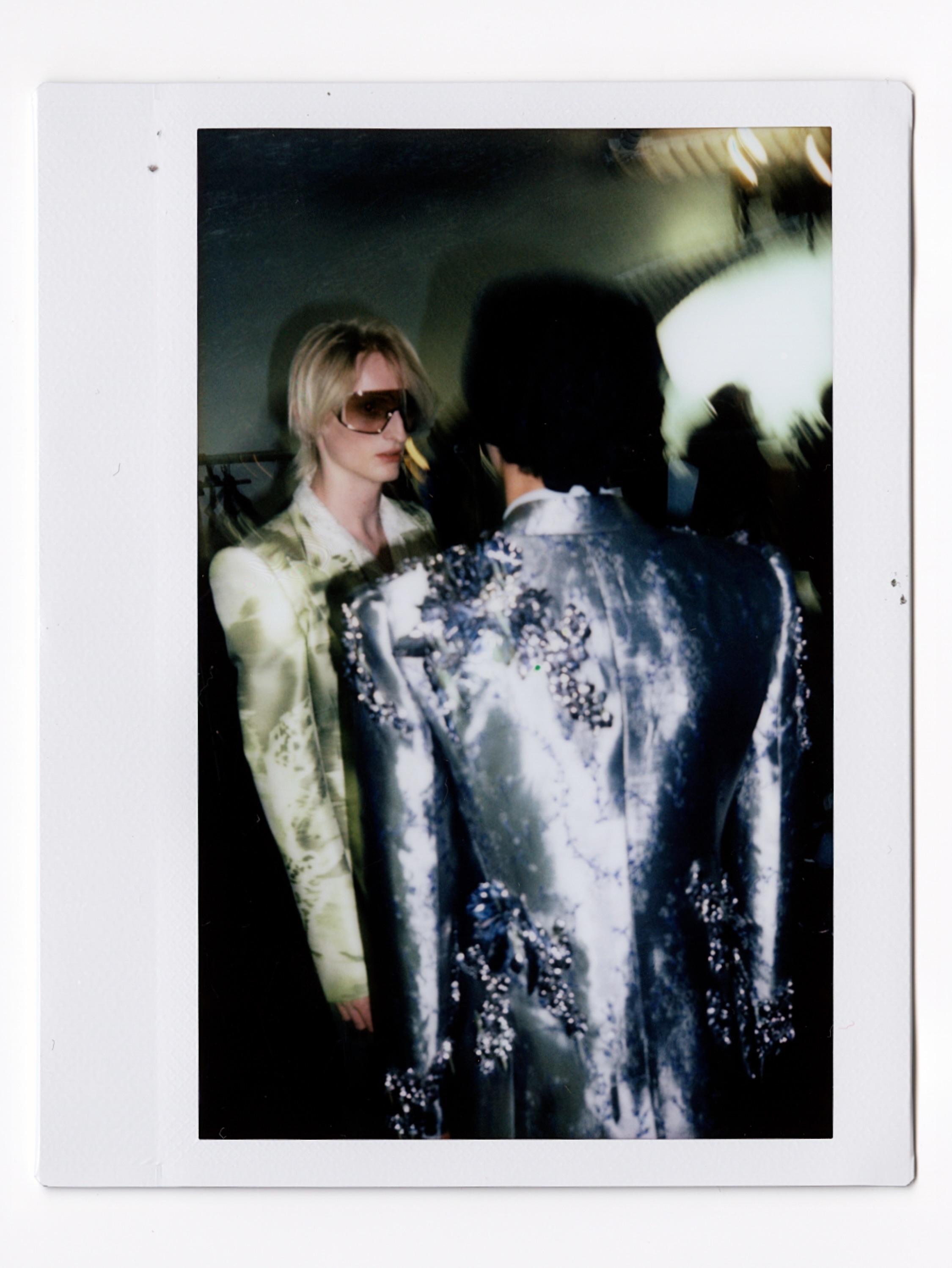 Model in profile showcasing hand-crafted embellishment detail