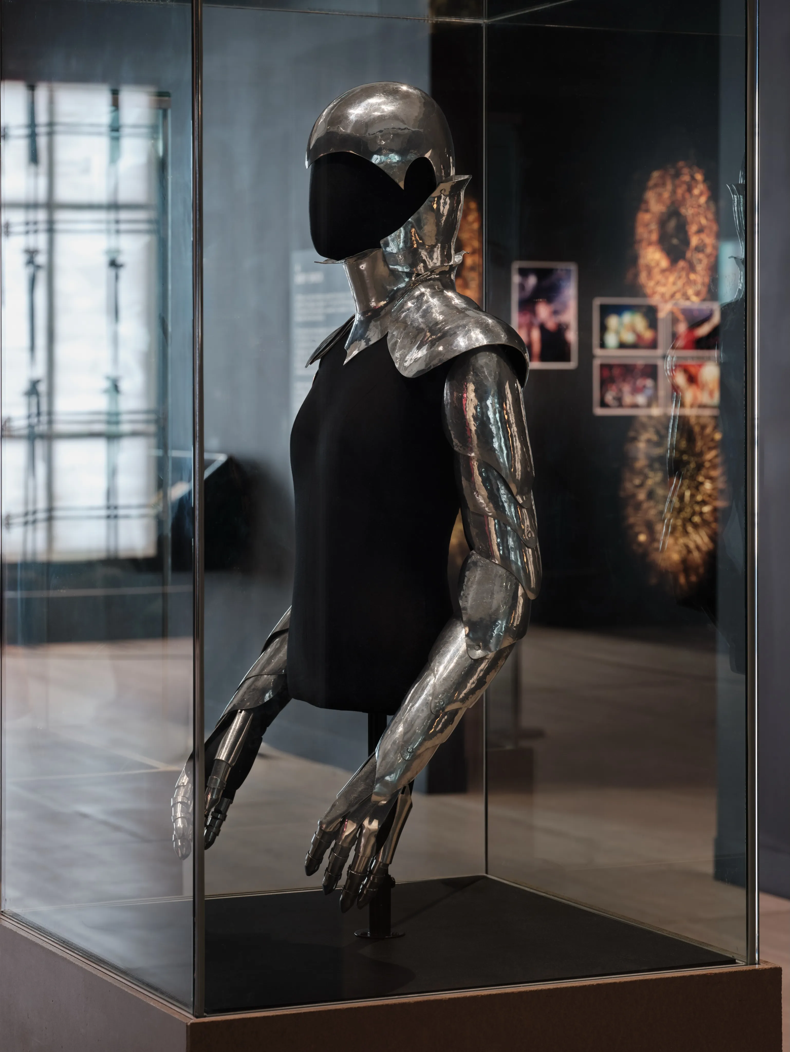 Close detail of structured metallic elements and handcrafted construction on display piece
