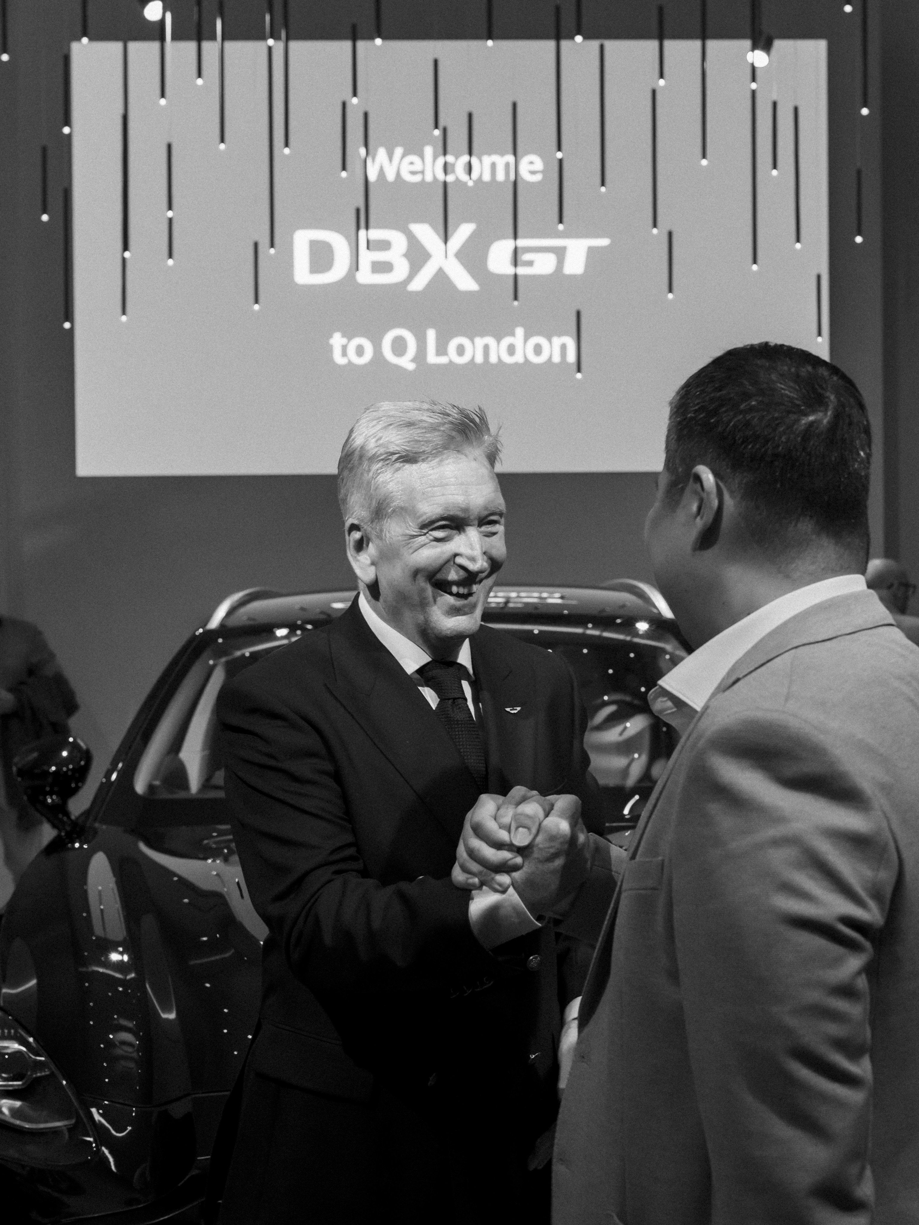 Front three-quarter view of the DBX GT showcasing its commanding presence