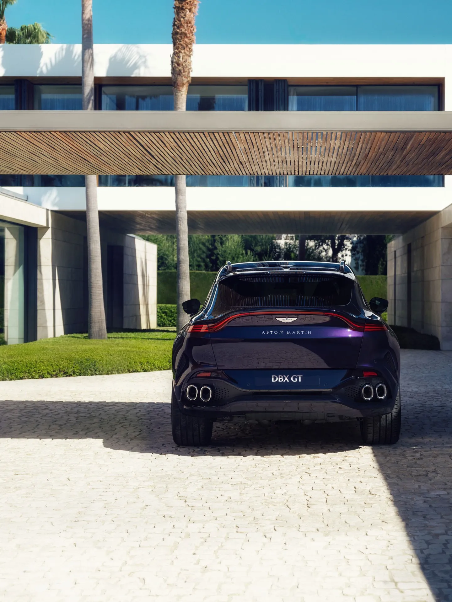 Rear angle view of DBX GT demonstrating confident, poised automotive design