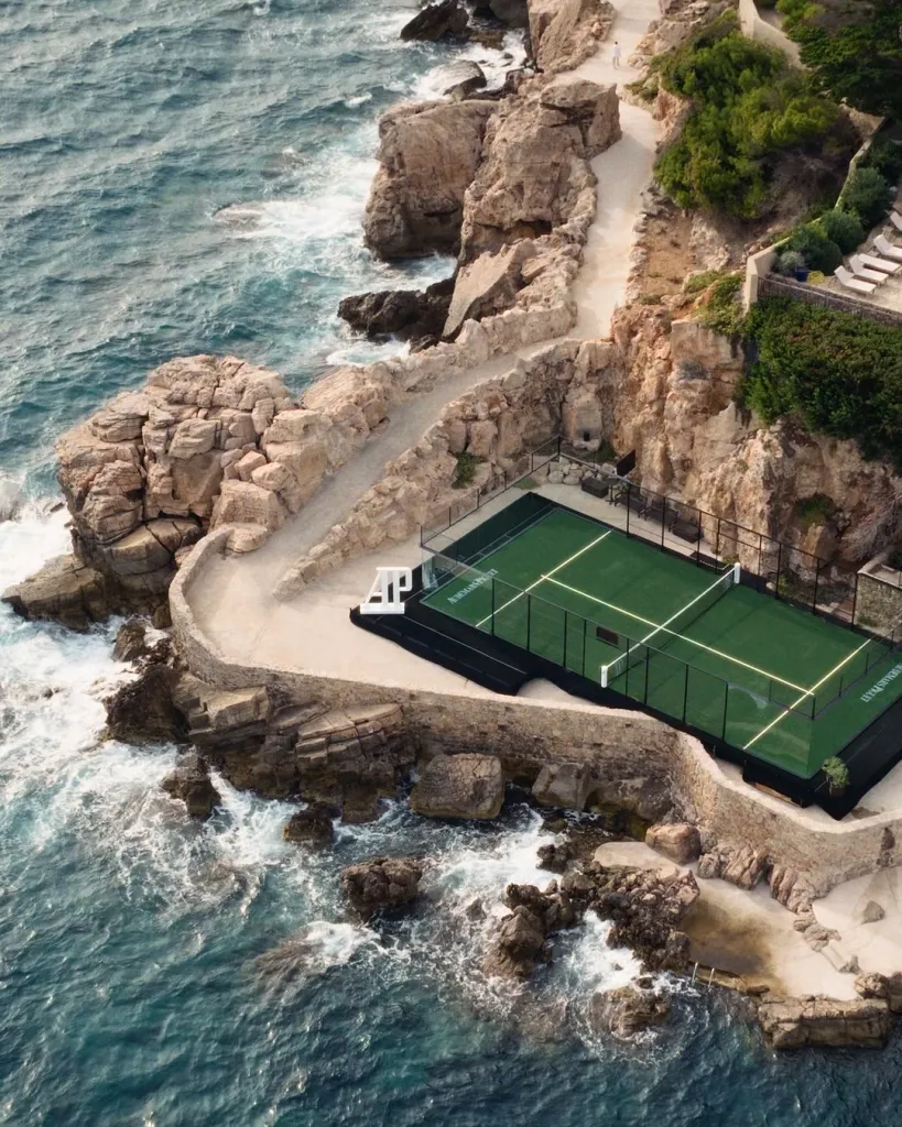 Panoramic view of the tournament venue set against crystalline Mediterranean seascape