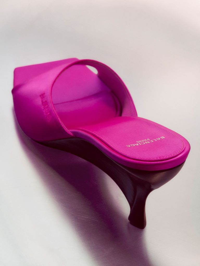 Dahlia Wedge Mule in complementary tone displayed with collection piece