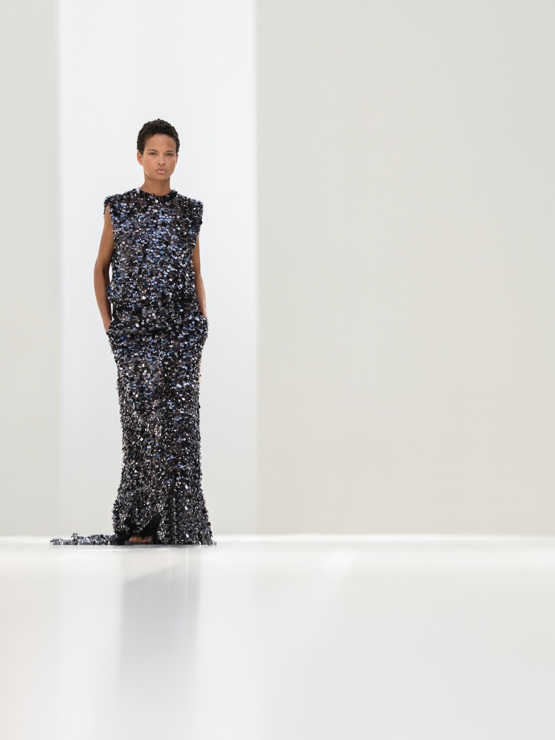 Balenciaga Summer 27 collection styling showing refined coral ensemble