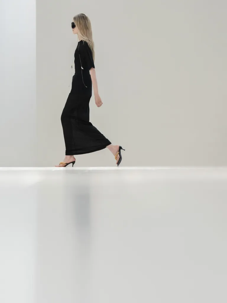 Model showcasing fluid silhouette from Balenciaga Summer 27 Les Coraux de la Liberté