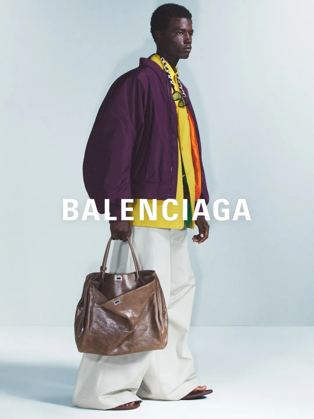 Full-length look featuring architectural volume and refined proportions