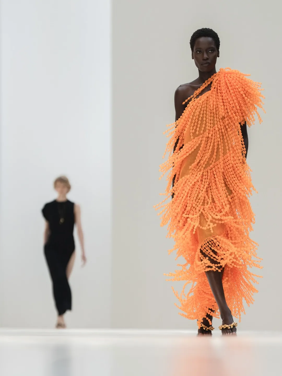 Layered separate in soft palette illustrating the collection's sophisticated approach to texturing
