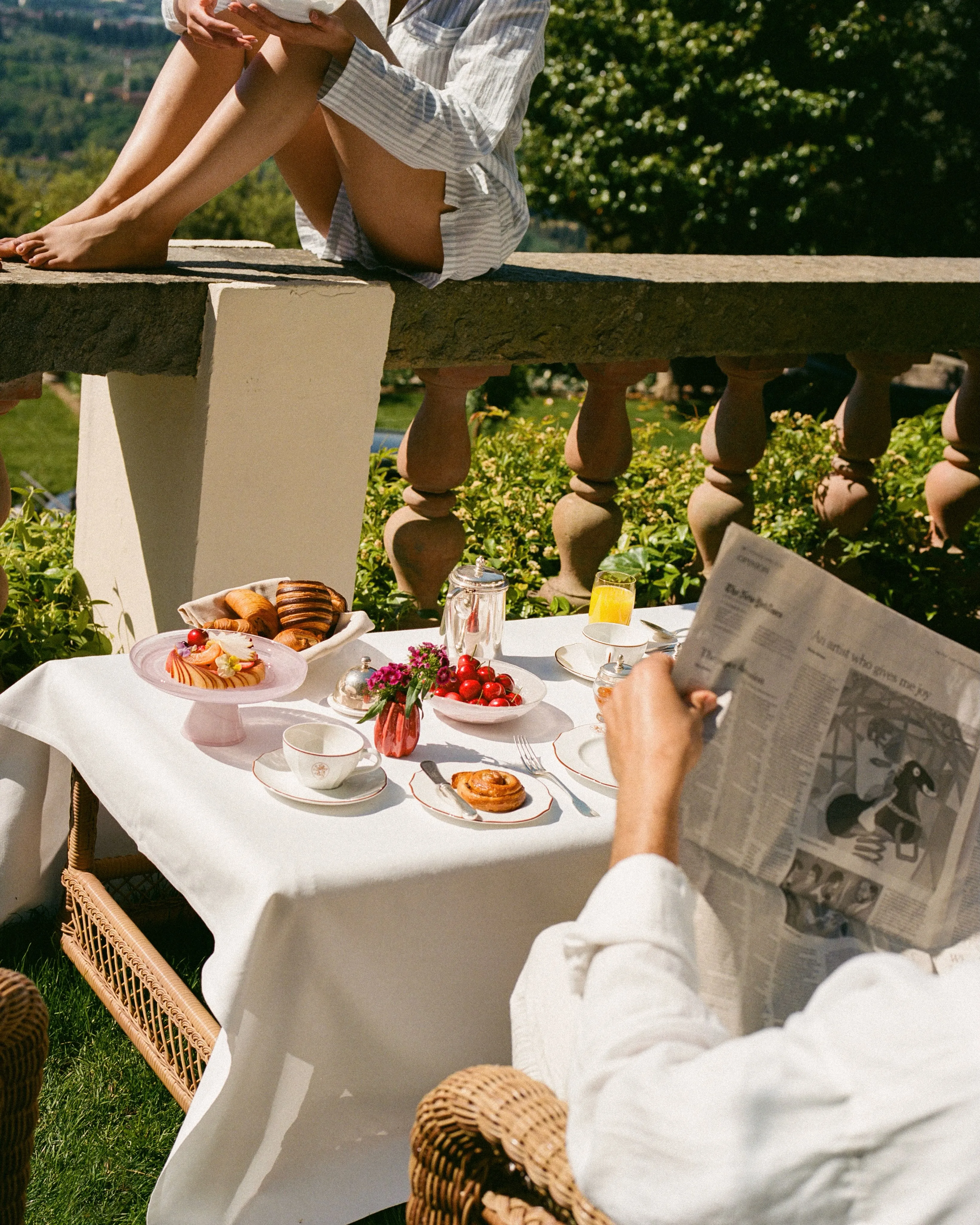 Elegantly arranged breakfast table overlooking the Florentine roofscape and distant Tuscan hills