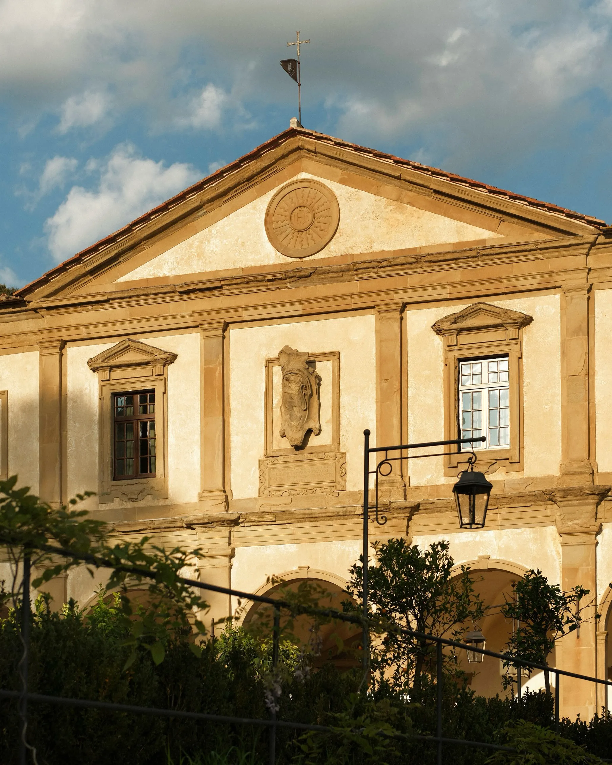 Expansive garden vistas stretching towards the Florentine landscape during the golden hours