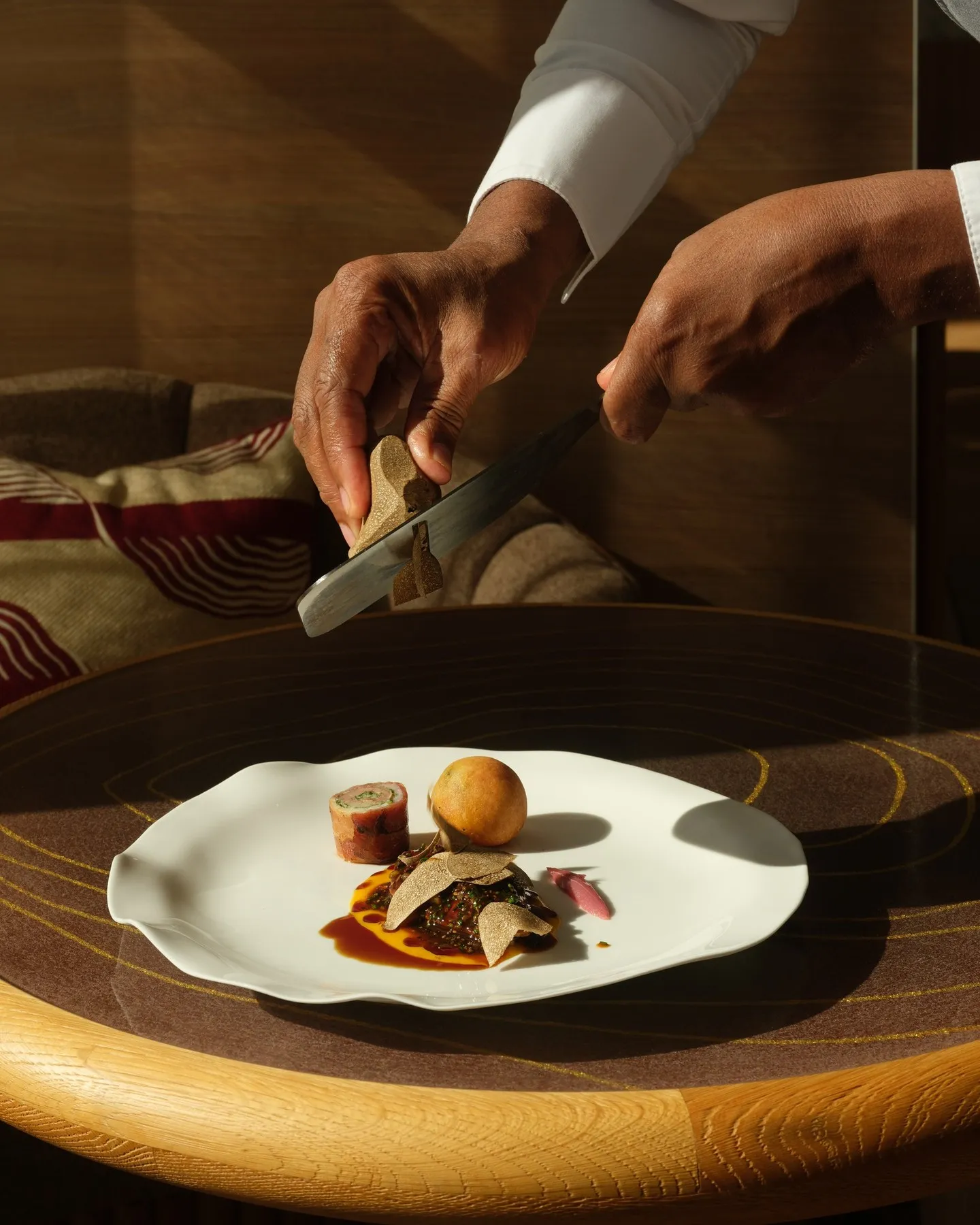 Close detail of the pigeon dish showcasing its refined culinary composition