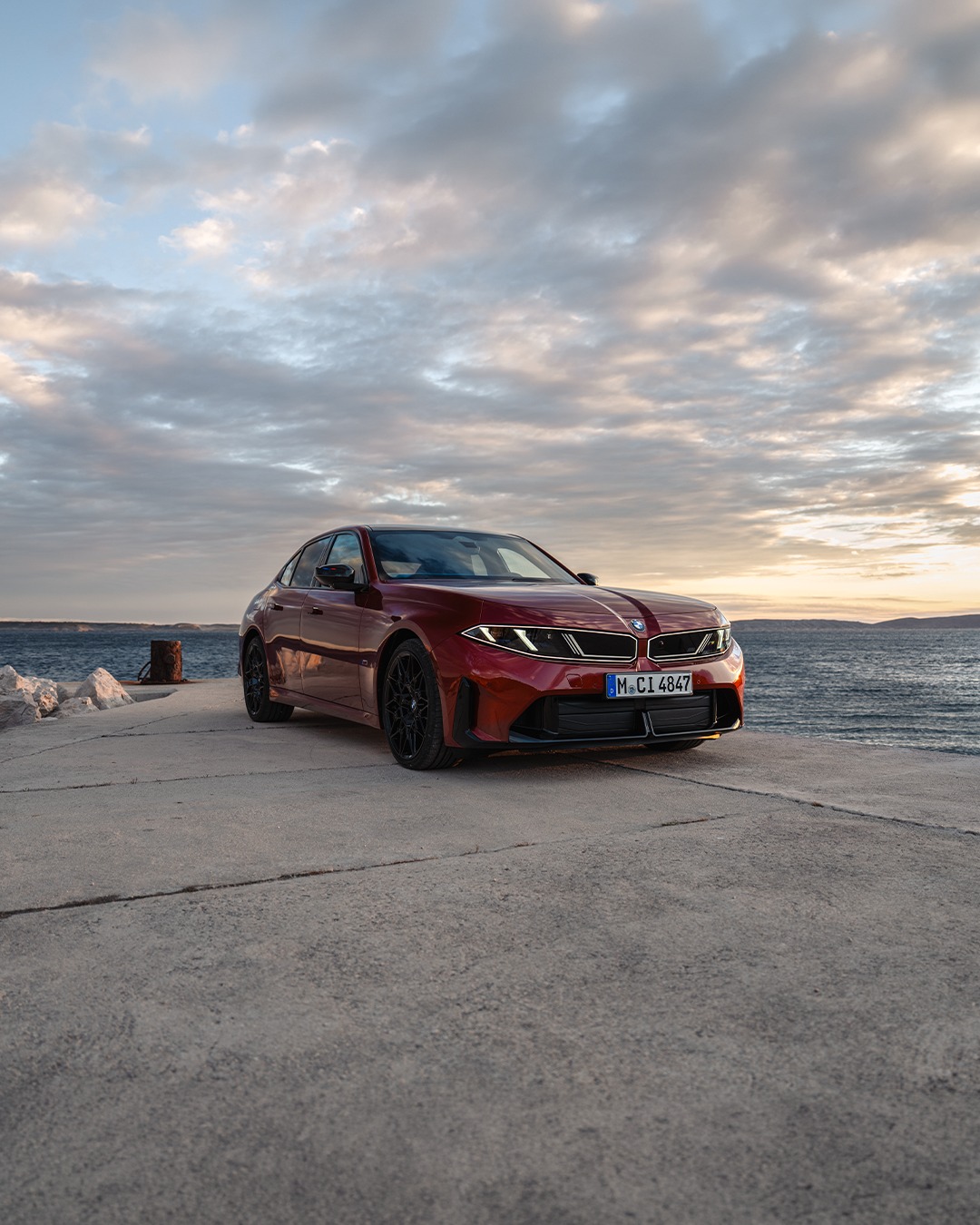 BMW M350 xDrive rear perspective emphasizing its performance-oriented architecture