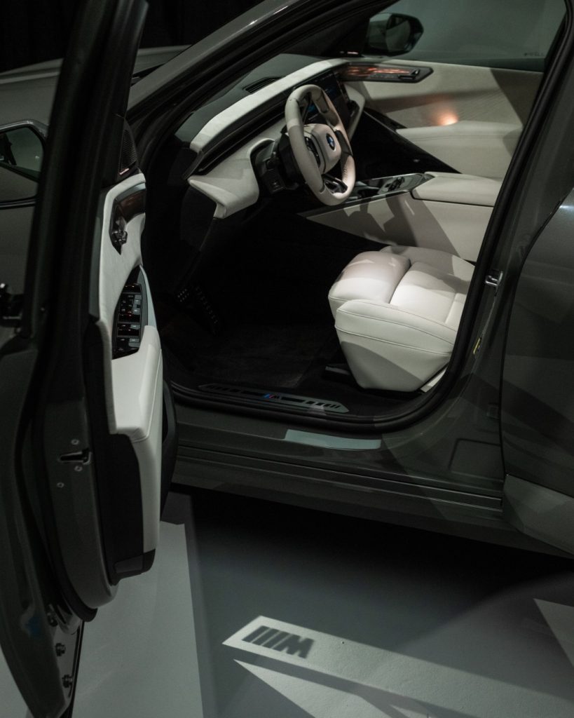 The new BMW X5 in dynamic motion highlighting its performance capability