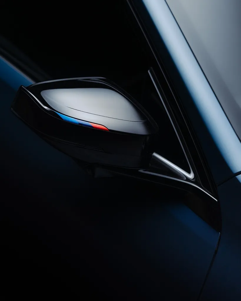 Detailed view of the BMW i3 M60 xDrive's front end with elegant sculpted surfaces