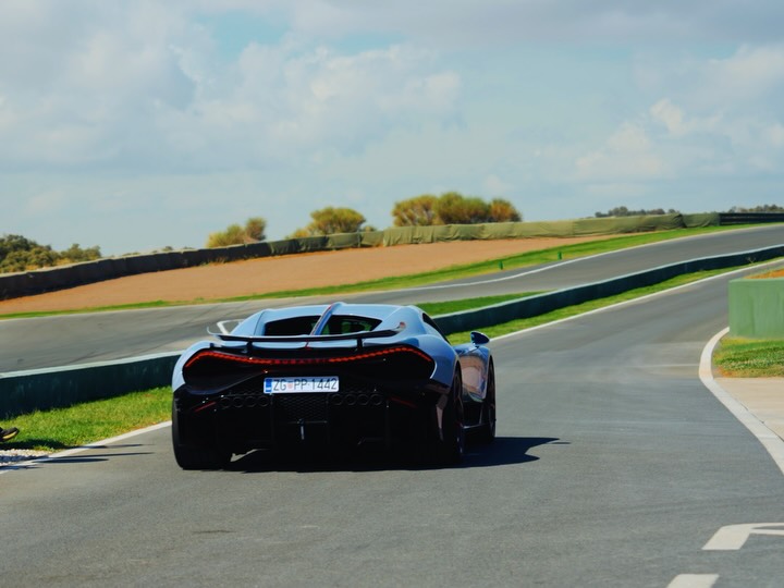 Multiple Bugatti generations displayed together at Ascari race track