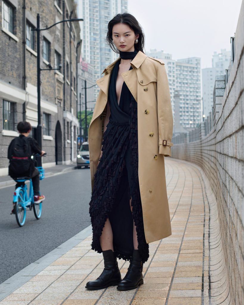 He Cong styling Burberry trench coat in Shanghai