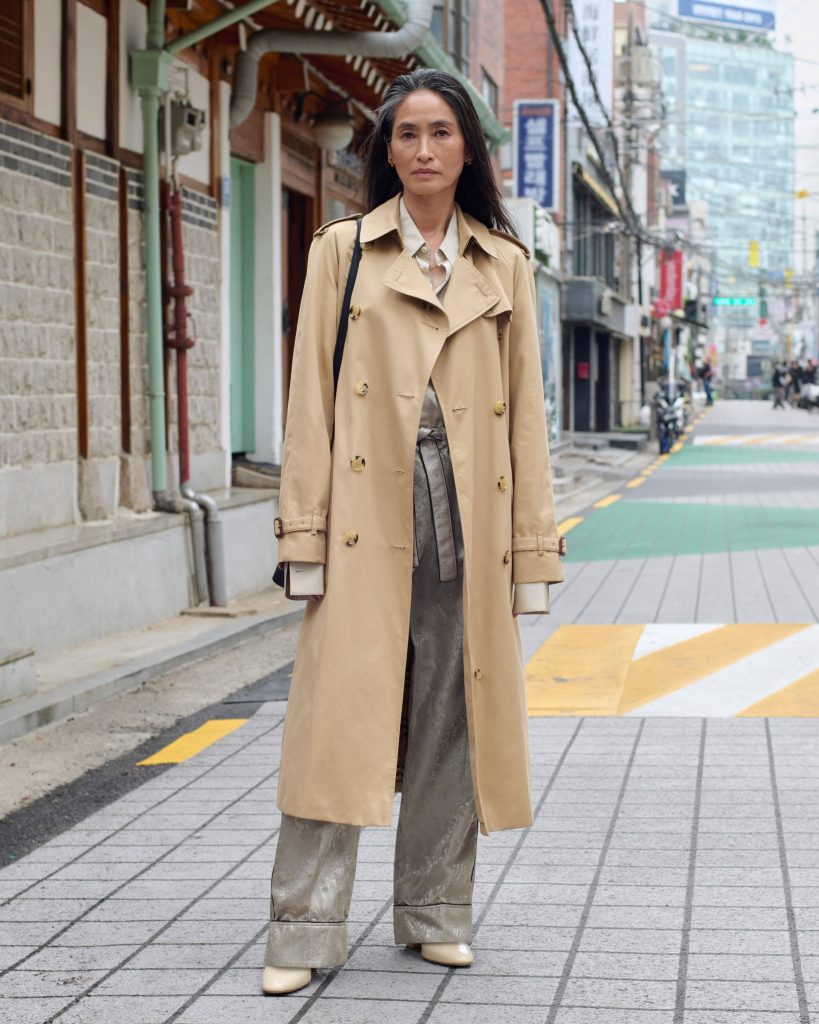 Susan Kim wearing Burberry trench coat in Seoul