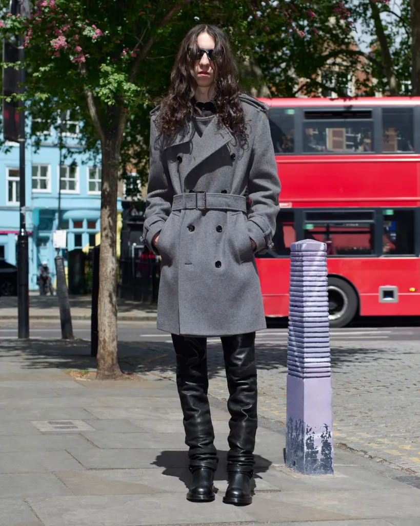 Taeo styled in Burberry's sophisticated car coat in Seoul, showcasing impeccable proportion and restrained luxury