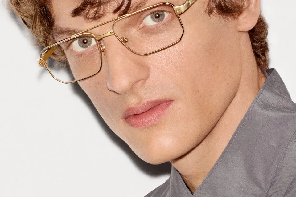 Santos de Cartier titanium eyewear frames featuring iconic mechanical screw detailing