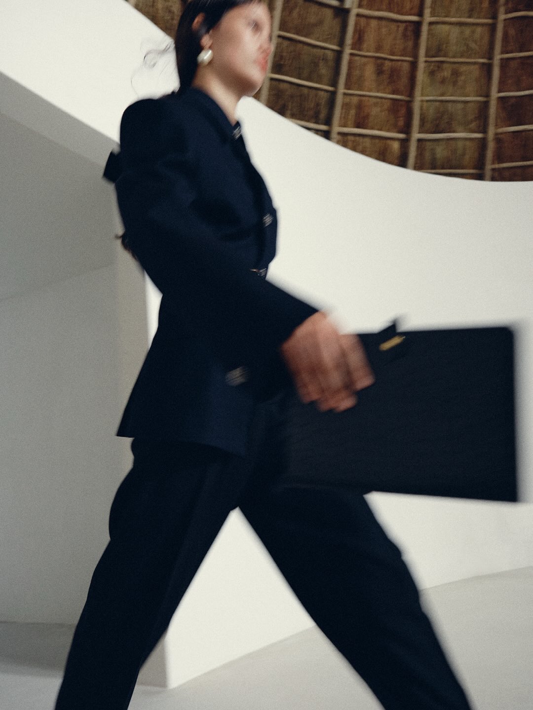 Flowing neutral coloured dress demonstrating Céline's mastery of architectural draping