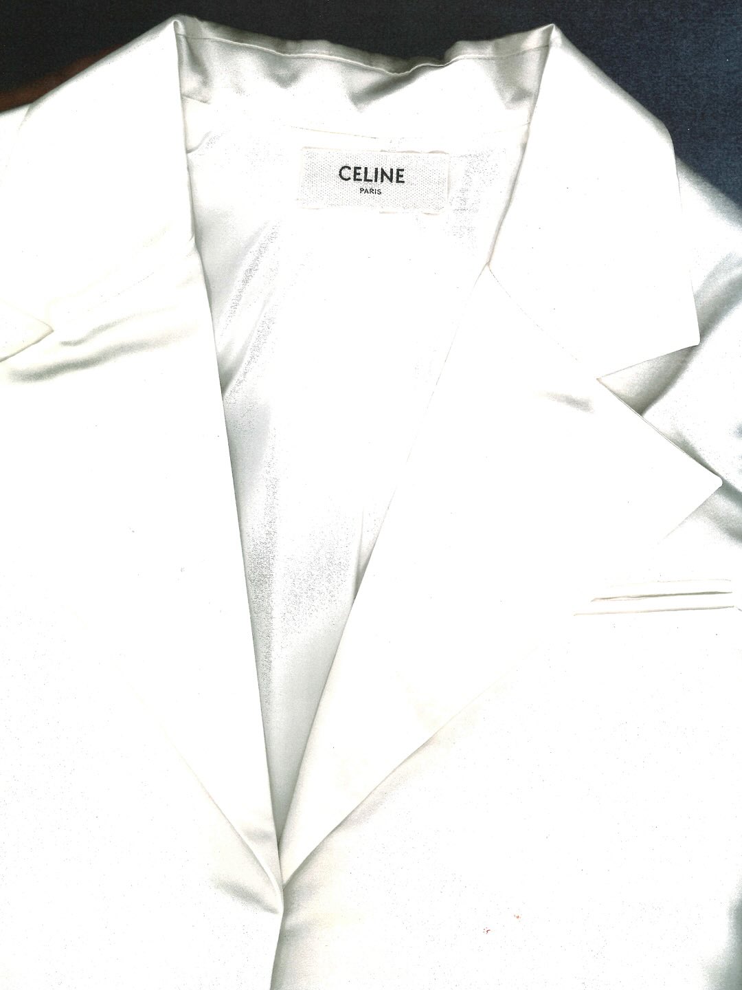 Close-up detail of luxurious fabric texture and refined construction detail