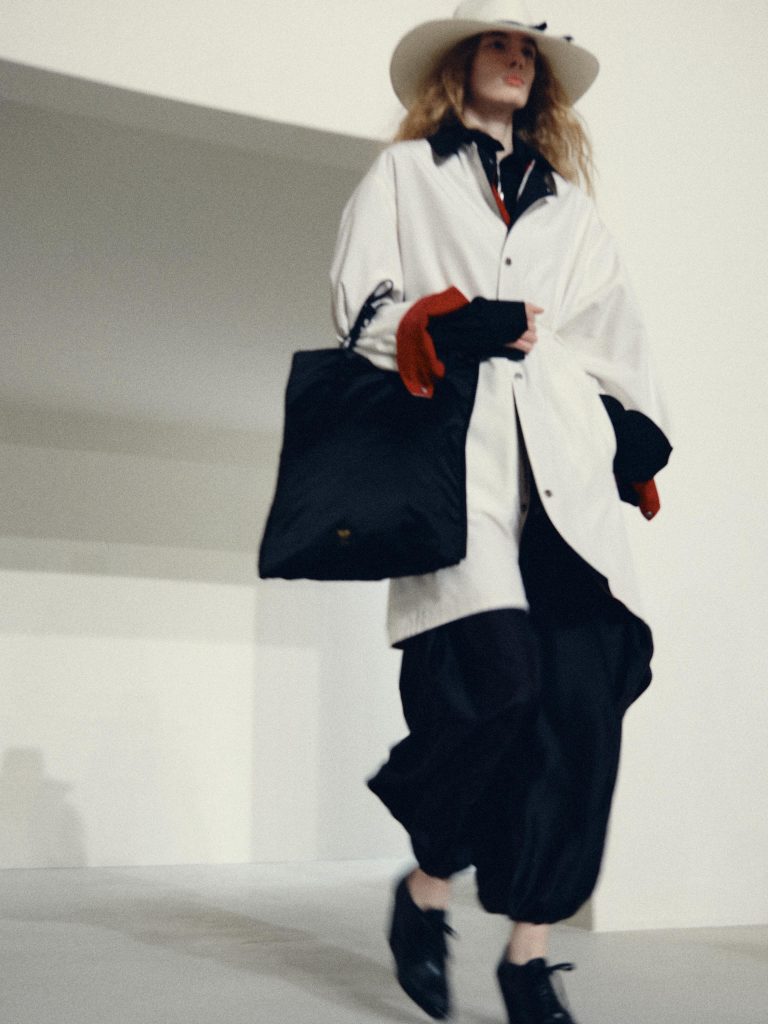 Tailored ivory trousers with precise tailoring detail, Summer 2027 collection