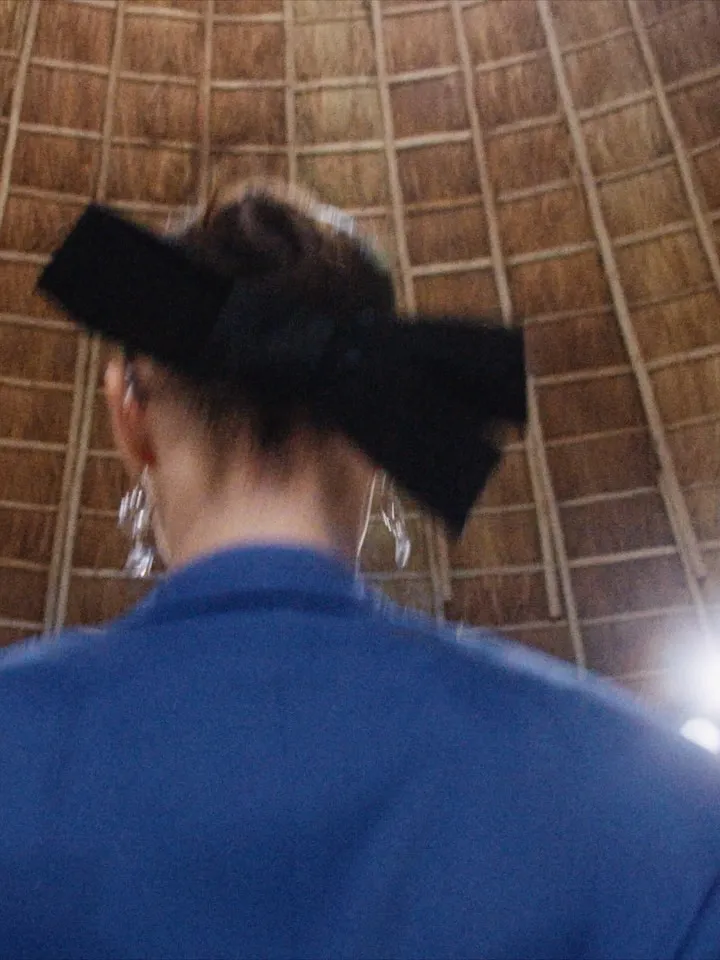 Wide shot showing silhouette and proportion of collection piece