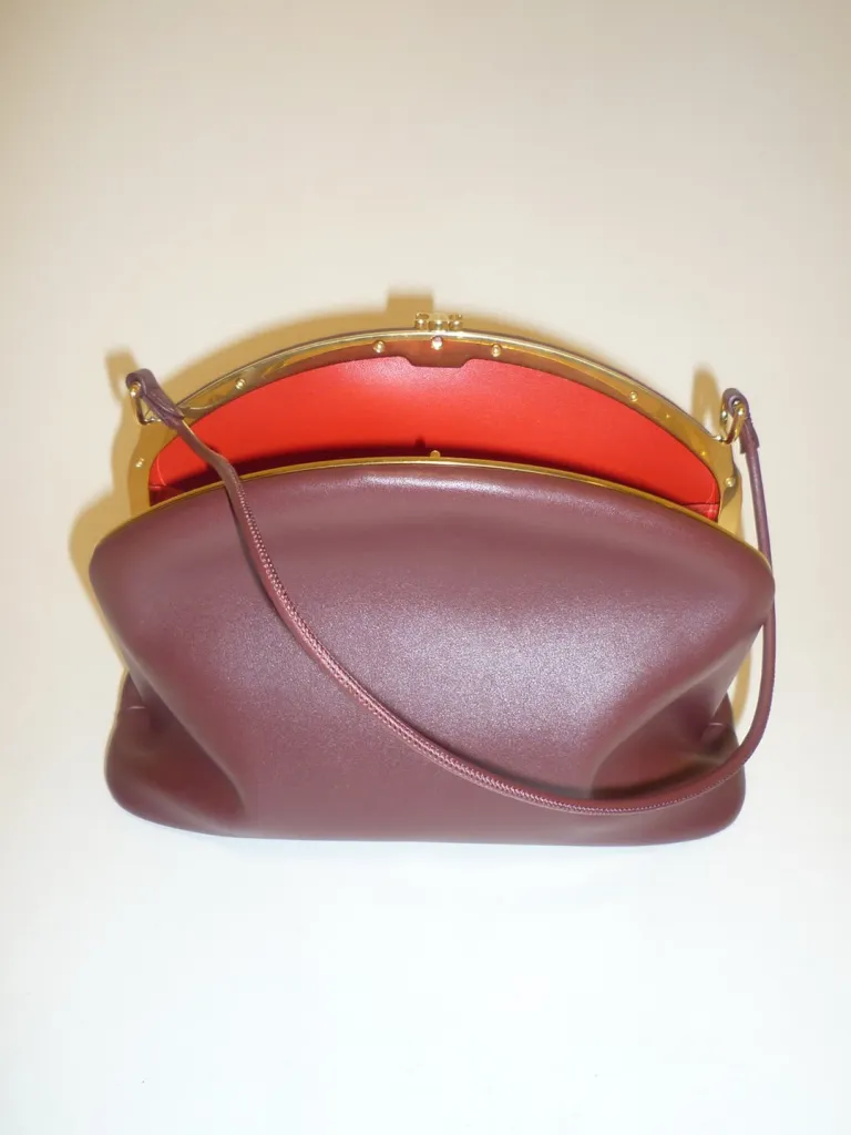 Close up of refined Celine accessory in neutral tones