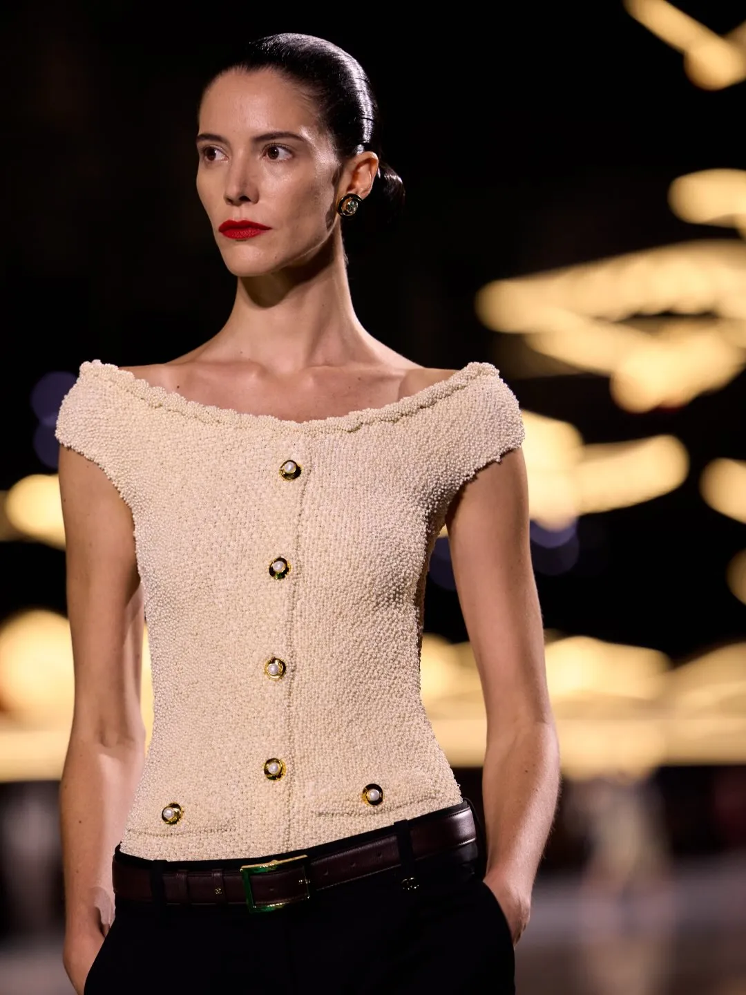 Model in flowing gown showcasing the transition between ethereal and structured