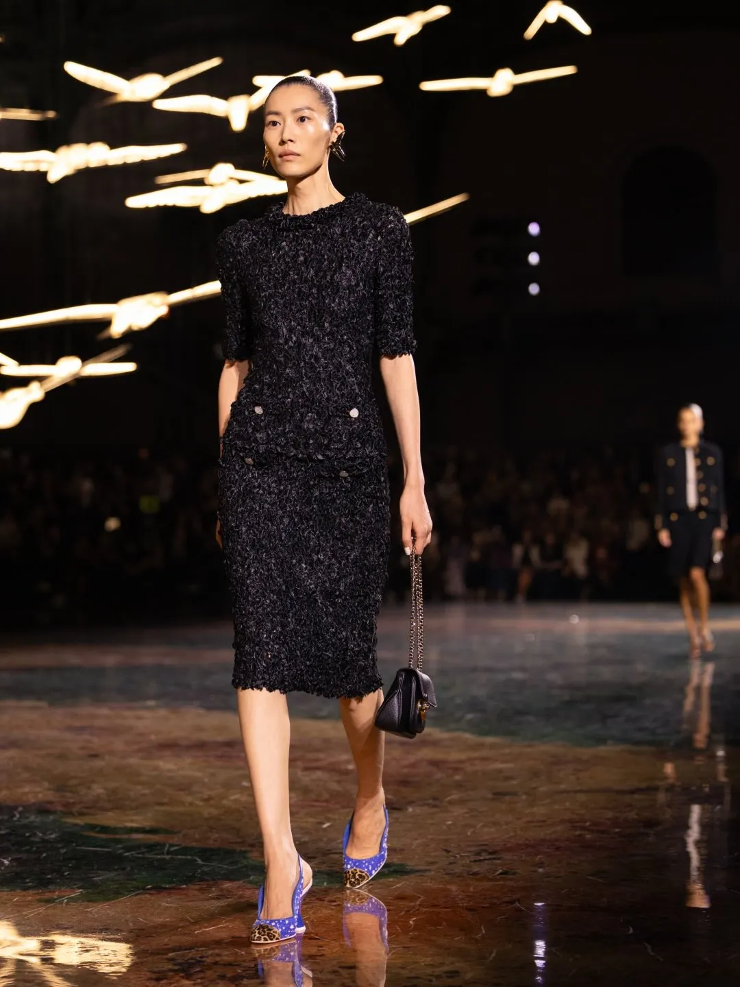 Intimate detail of embroidered florals on refined fabric