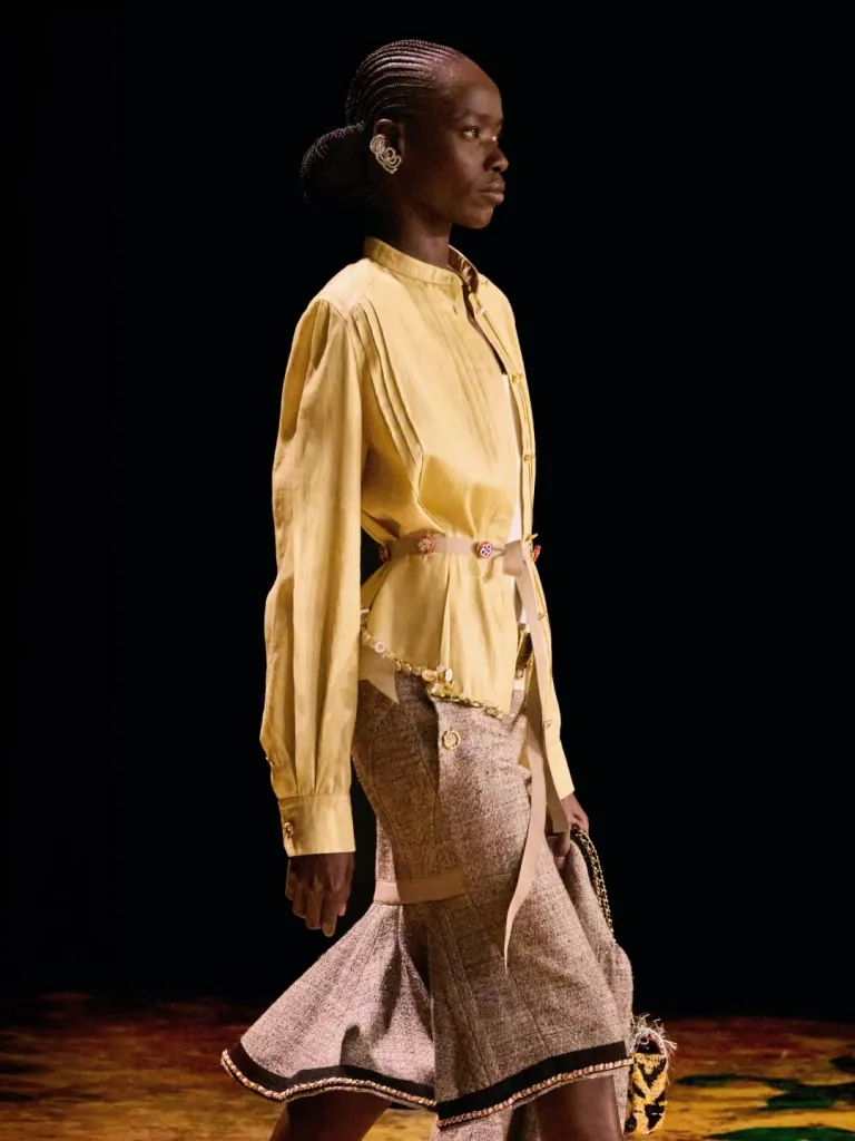 Overhead view of a garment displaying the refined construction and layering of lightweight cottons