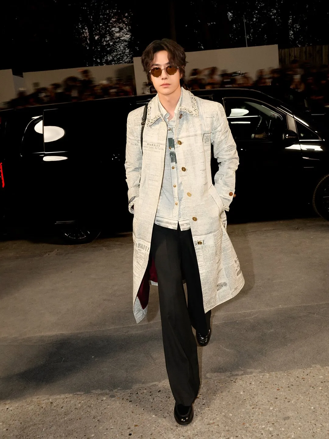 Flowing trousers in oyster tone paired with soft knit