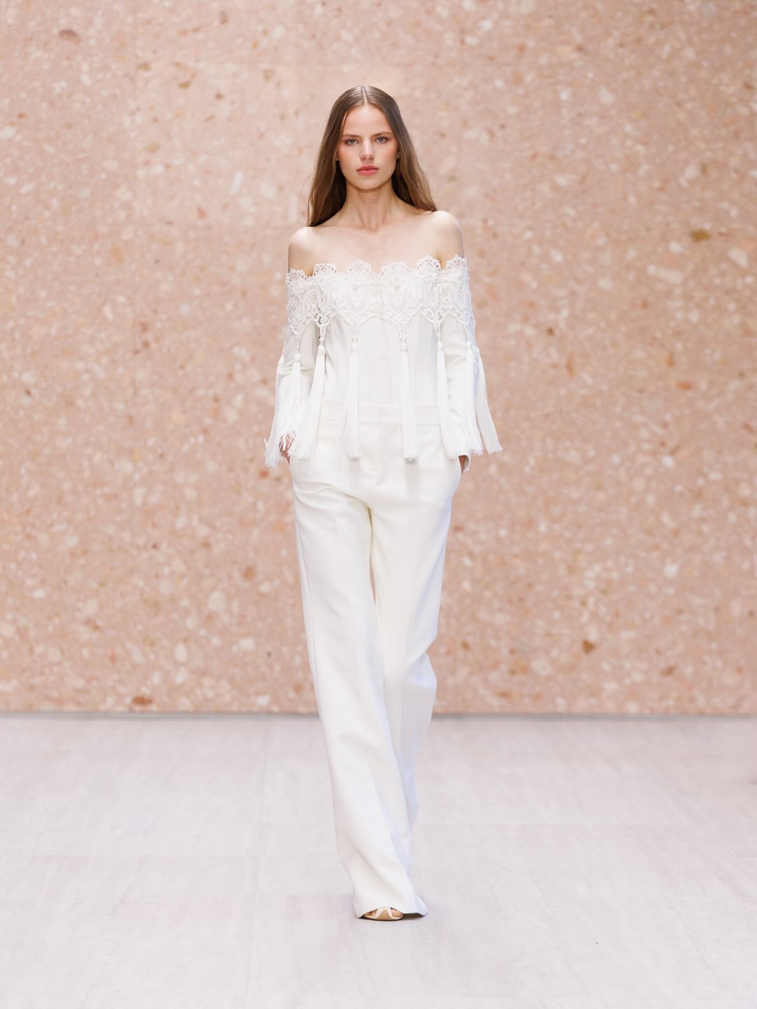 Ethereal cream coloured layered organza dress with delicate beading detail