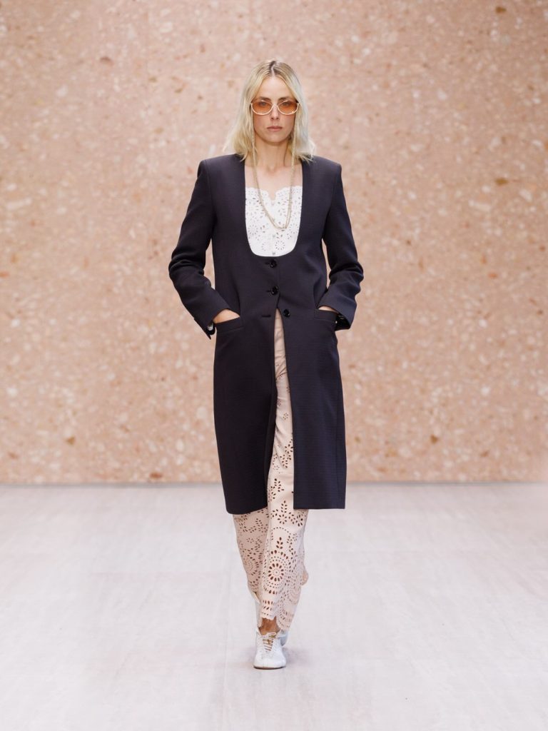 Model wearing languid silhouette that celebrates the feminine form