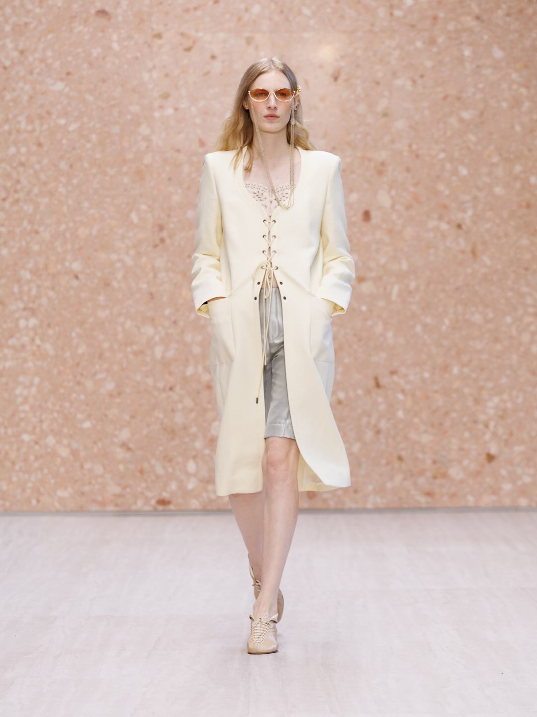 Model showcasing effortless, refined presentation of collection