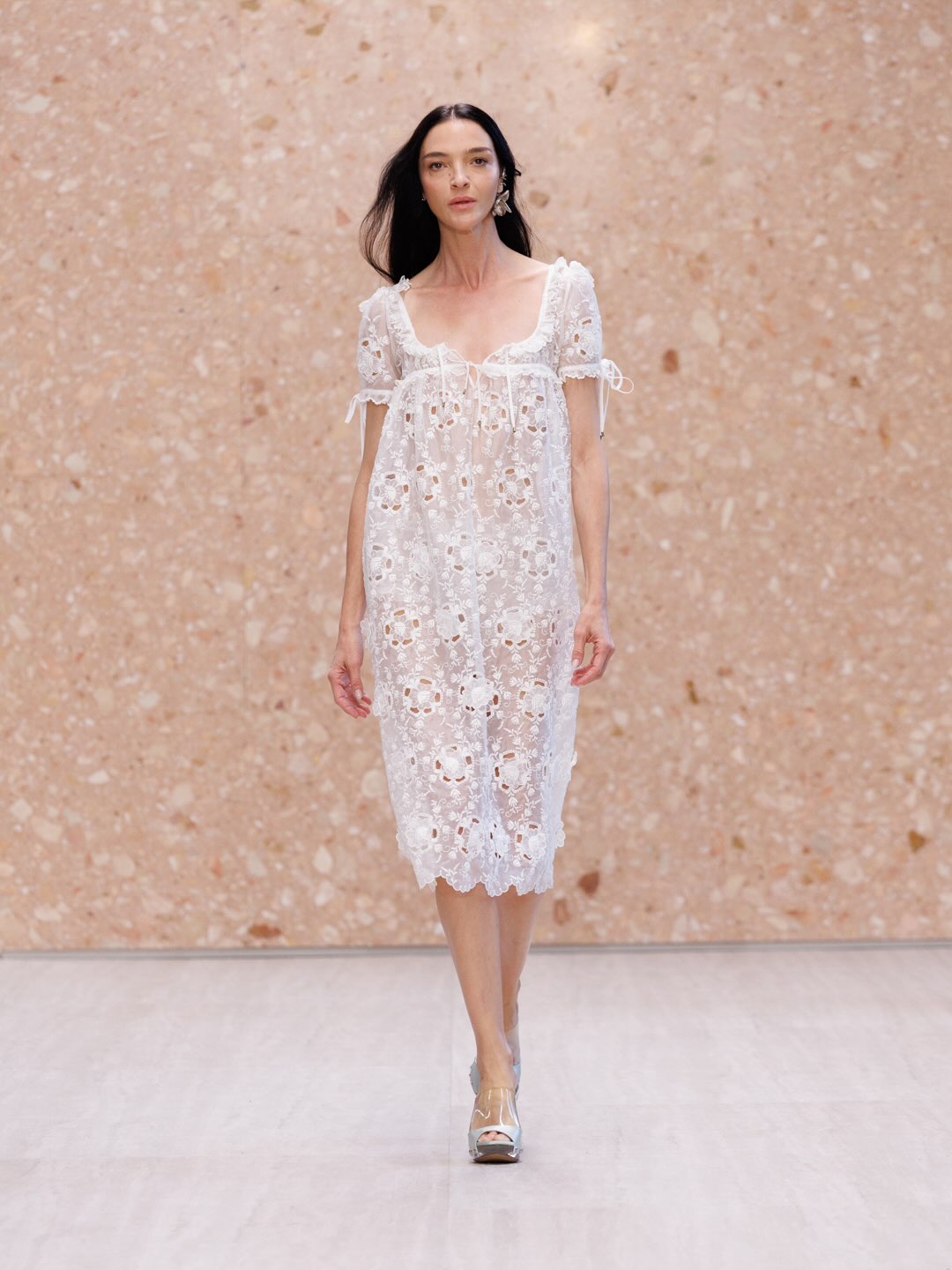 Final look encapsulating Summer 2027 vision of contemporary luxury