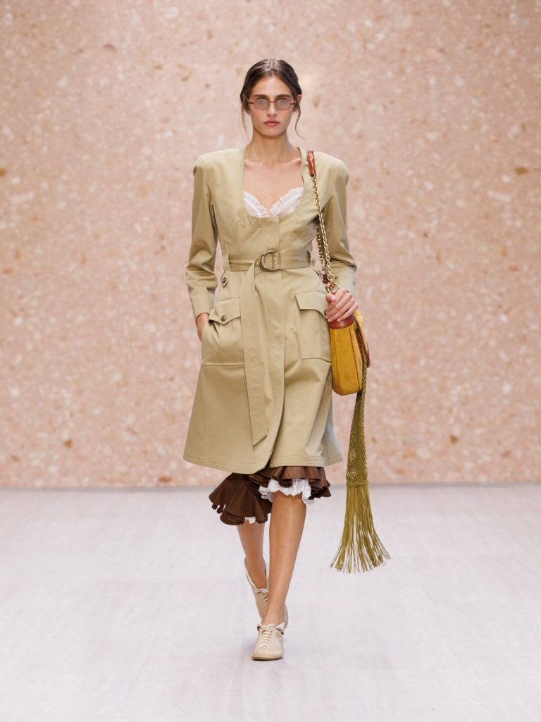 Full-length view of loose tailored trousers with relaxed silhouette