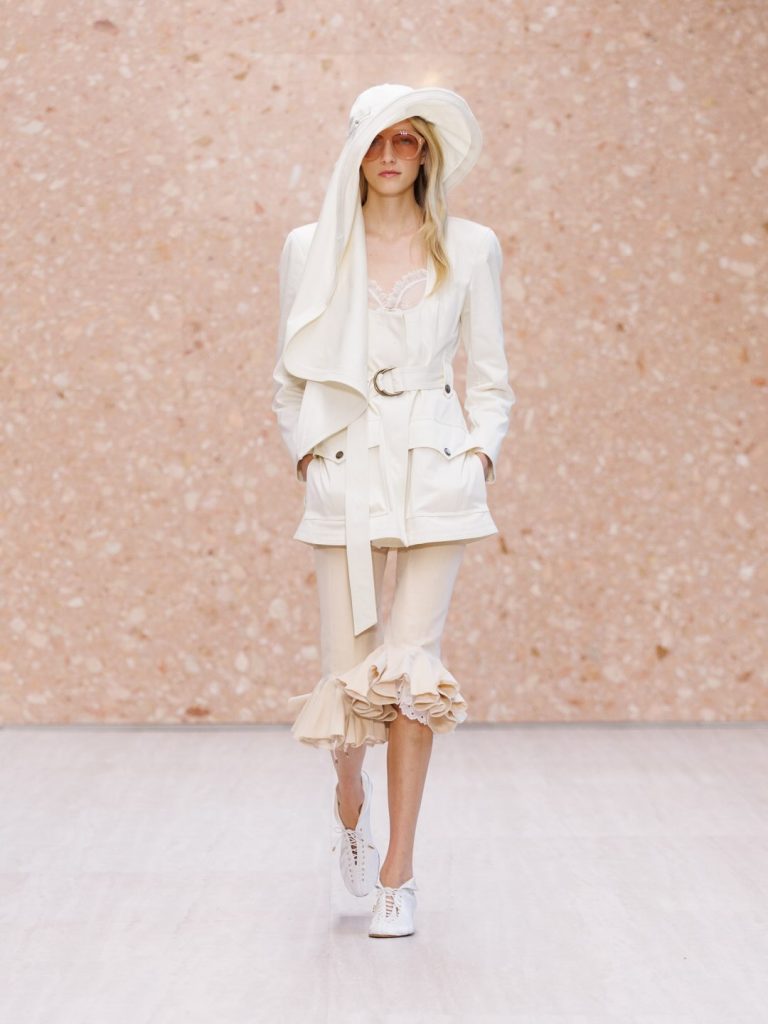 Layered sheer fabrics creating textural depth and movement