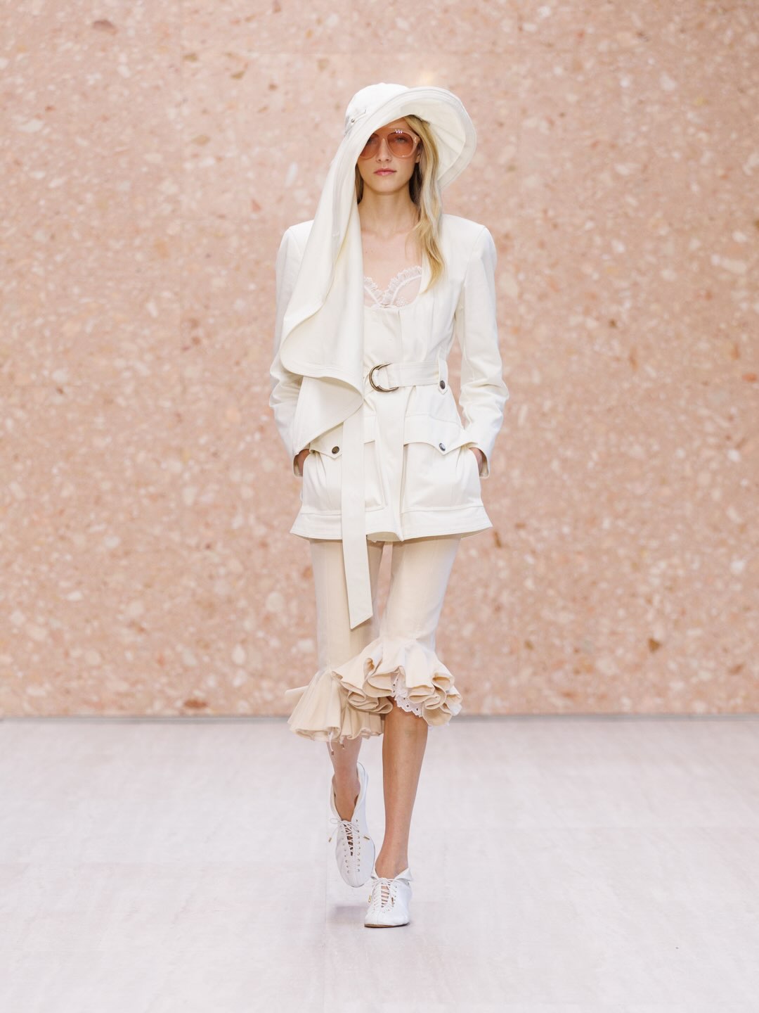 Layered sheer fabrics creating textural depth and movement