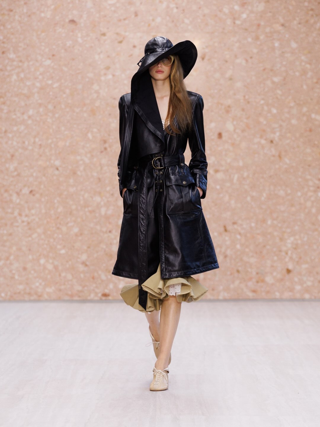 Neutral-toned ensemble demonstrating refined colour palette
