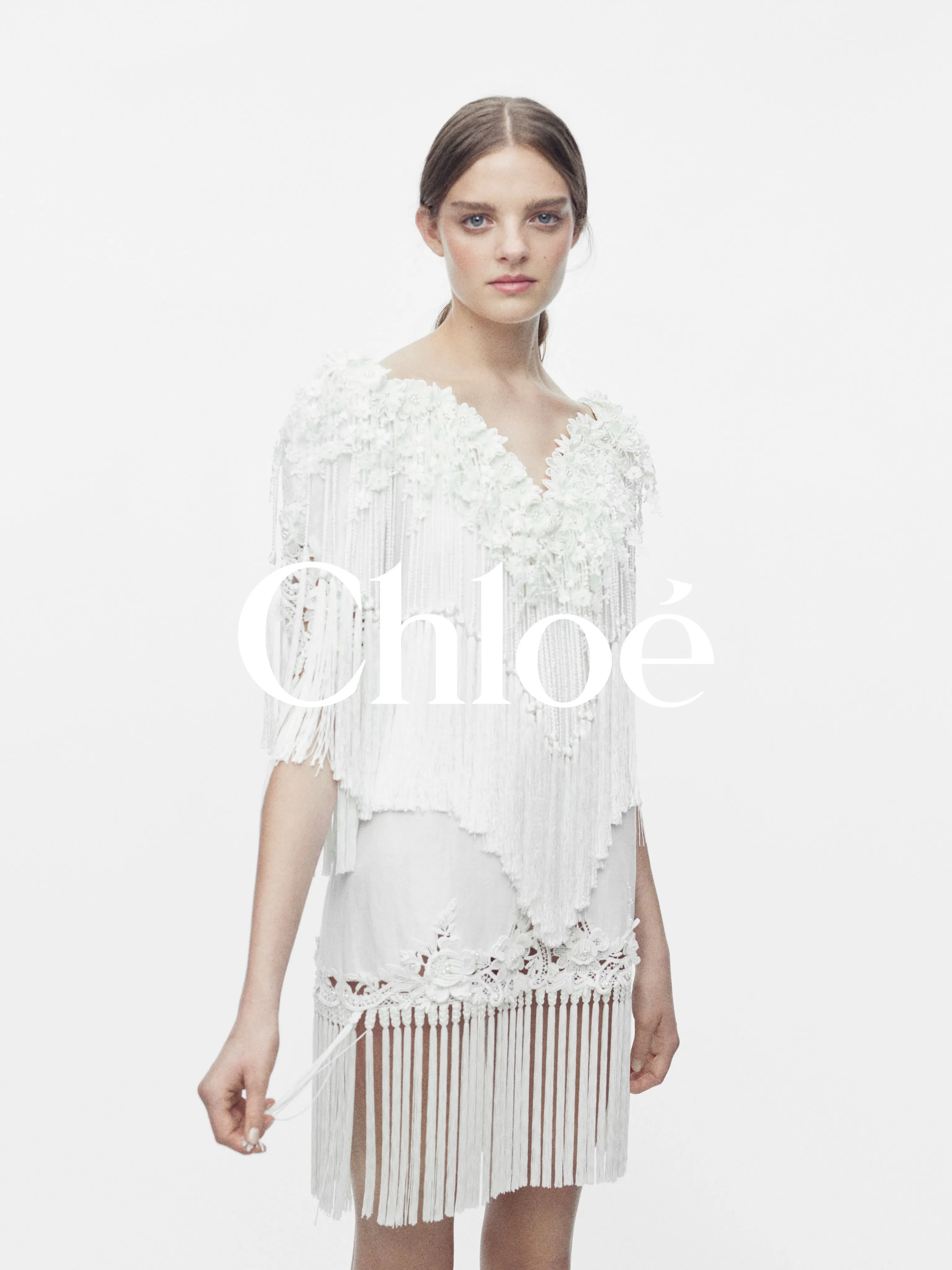 Portrait of model Amelia Barron wearing Chloé Summer 27 designs, photographed by Willy Vanderperre
