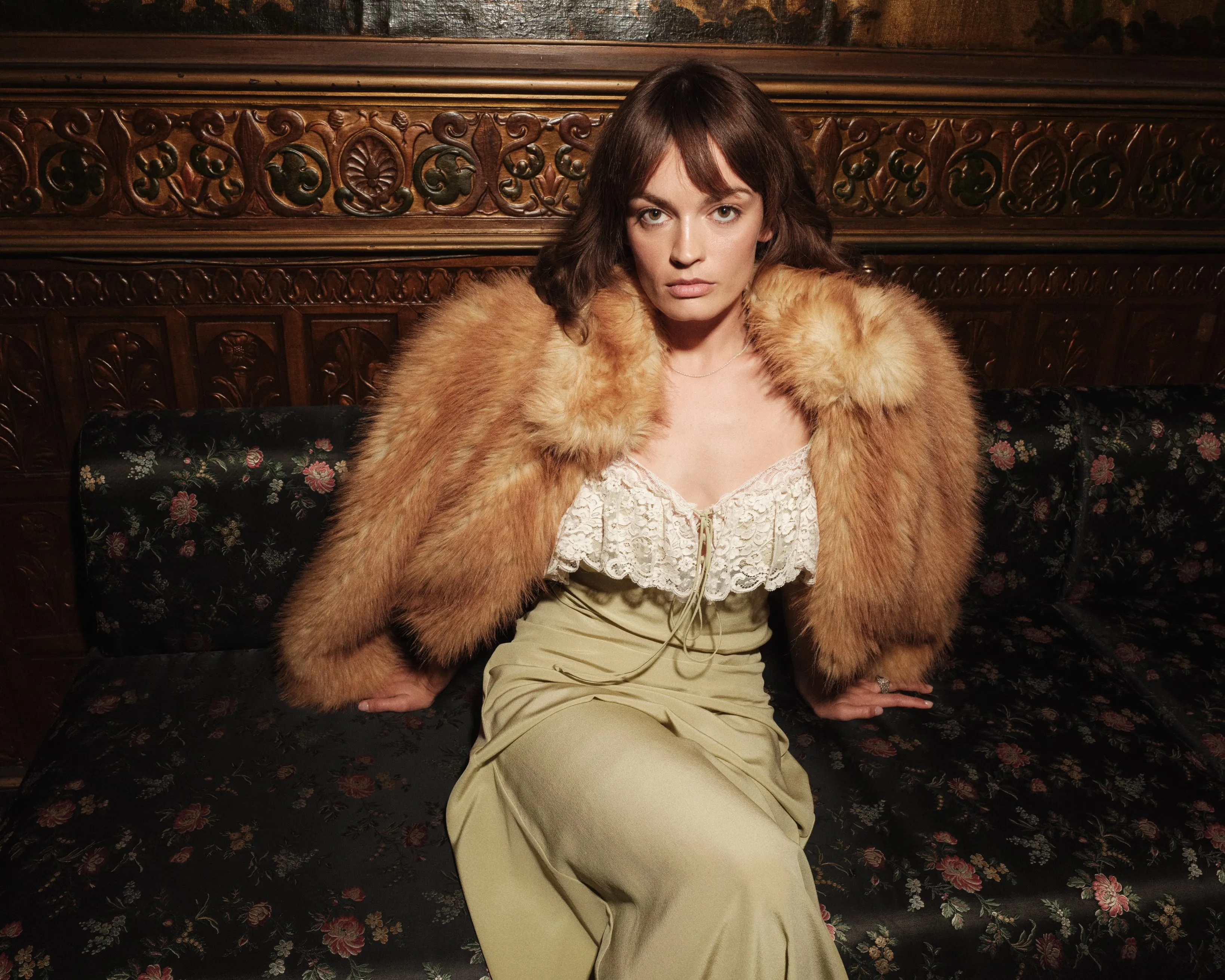 Model presenting layered Chloé pieces in harmonious neutral tones